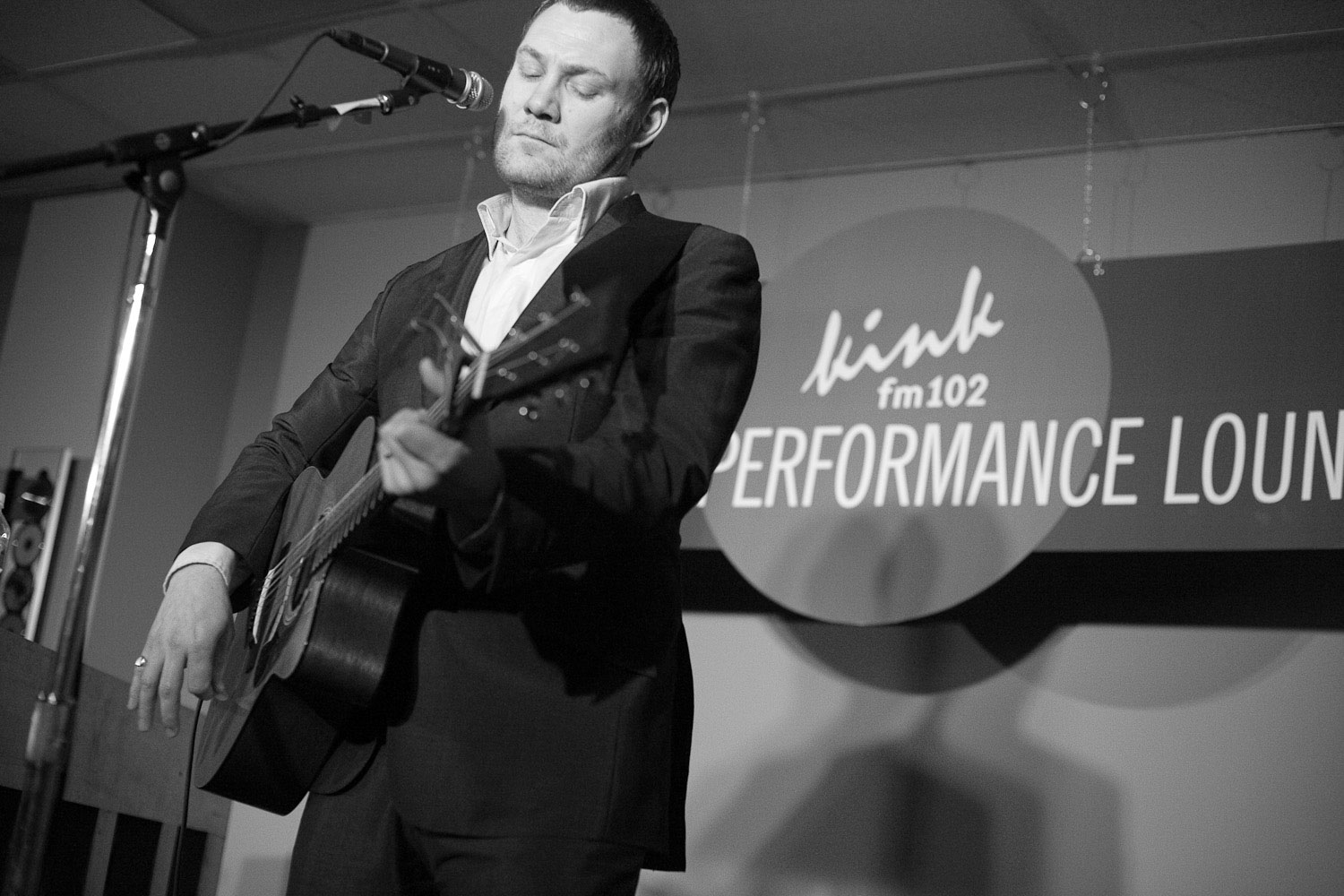 David Gray plays the guitar at the Live Performance Lounge