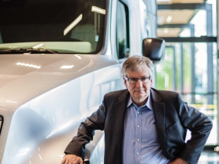 Oregon Business Cover June 2016 stands with big rig