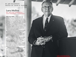 Larry Mullins standing outside smiling.