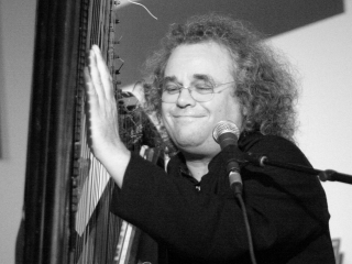 Andreas Vollenweider plays the harp at live performance for KINK.FM radio.
