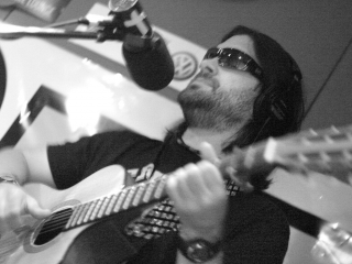 Bob Schneider plays in the studio