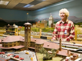 Columbia Gorge Model Railroad Club , Steven Watkins, in front of model trains