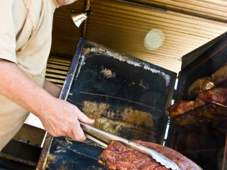 Darrell Boles at Big Kahunas barbecues ribs