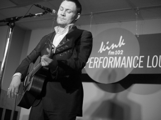 David Gray plays the guitar at the Live Performance Lounge